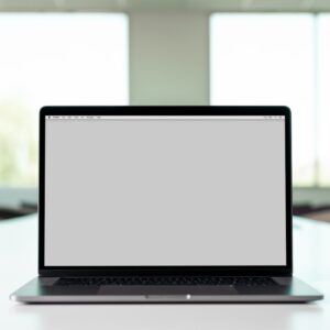 macbook pro on white table
