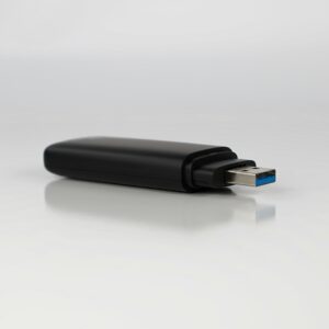 a close up of a usb device on a white surface