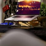 a laptop computer sitting on top of a desk