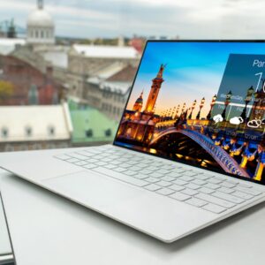 laptop on white table