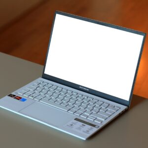 A laptop computer sitting on top of a table